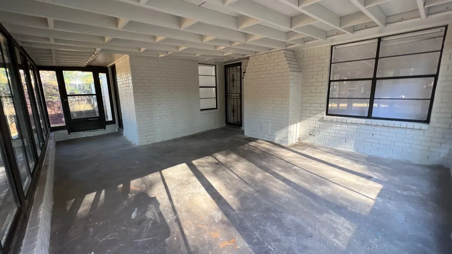 Renovations included finishing the porch, enclosing in glass.