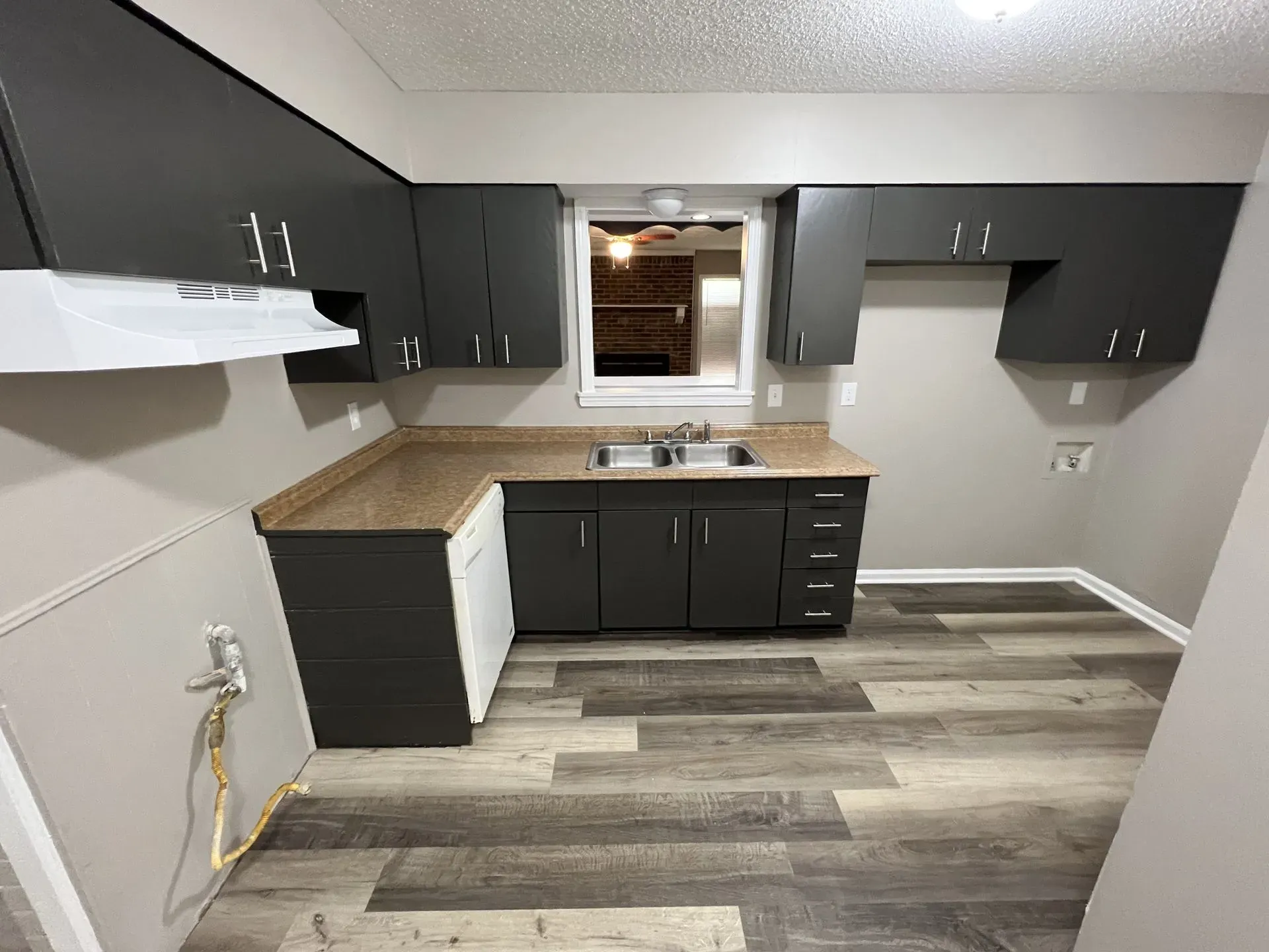 Kitchen remodeling with wood floors throuout first floor and modern style cabinets.