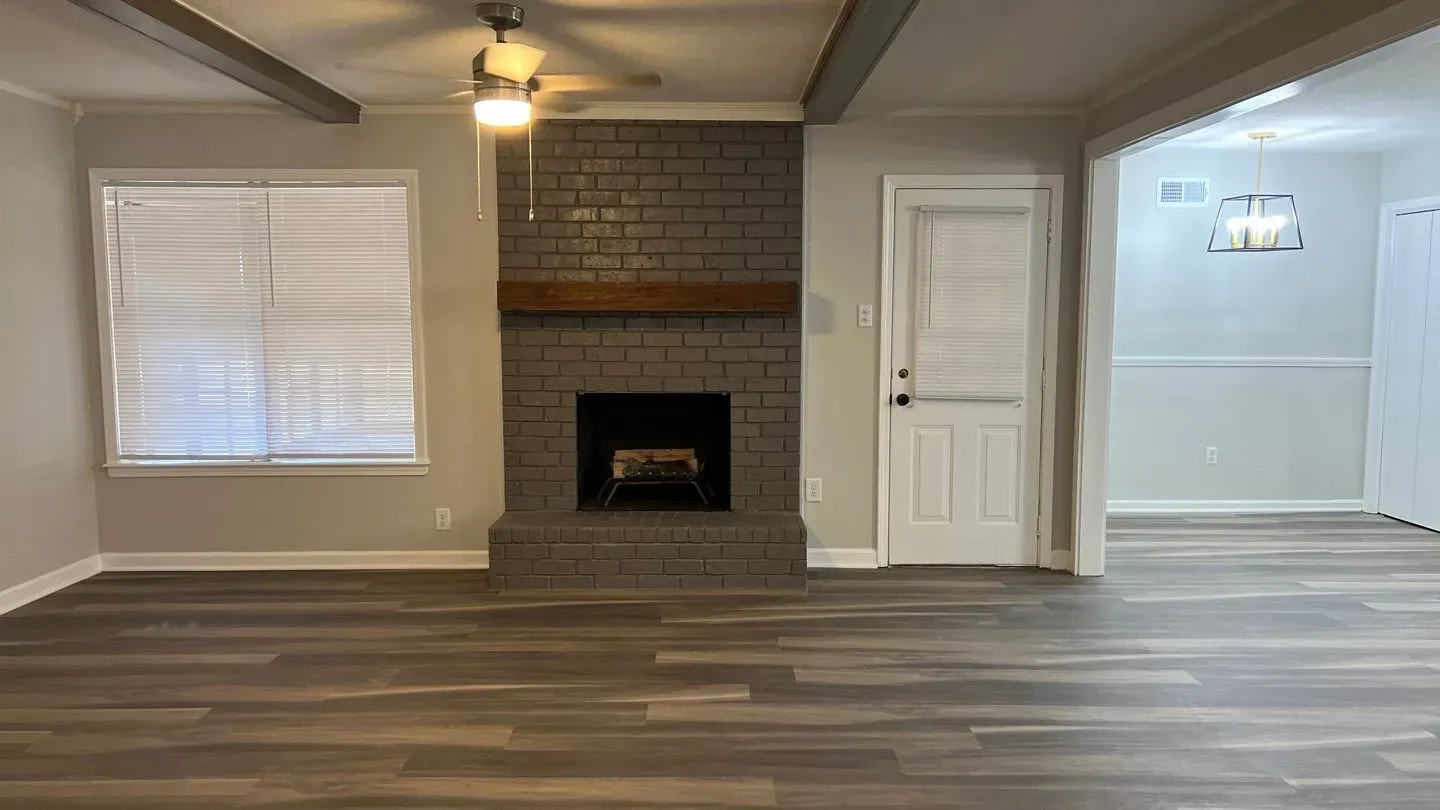 Living room showing the new floors installed after renovation.