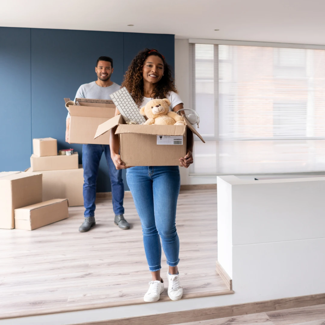 People moving with boxes. - Property management in Bartlett, TN