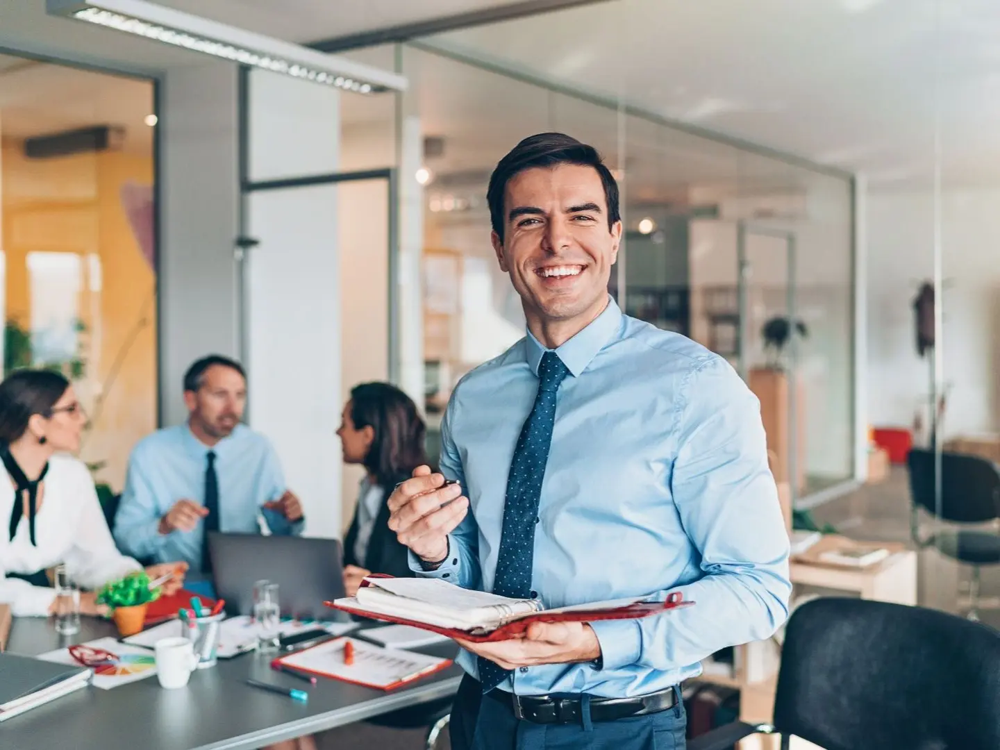 Cordova, TN BRRRR investor support, agent reviewing notes during a client meeting.