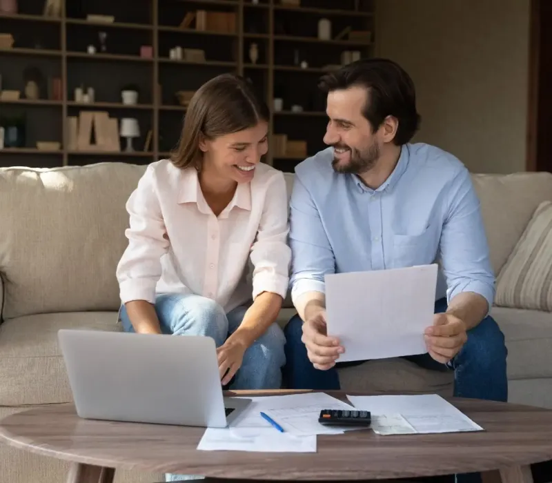 Nesbit MS rental property owners reviewing renovation budget and documents on a laptop.