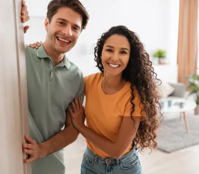 couple happy with their new purchased home