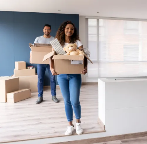 People moving with boxes. - Property management in Bartlett, TN