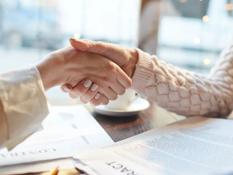 Tenant and landlord making an agreement after discussing all the rules