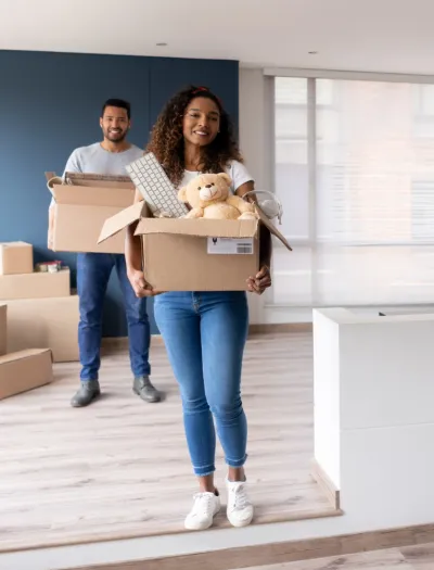 People moving with boxes.