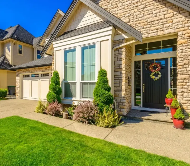 Renovated single-family rental in Cordova, TN with updated exterior, windows, and landscaping