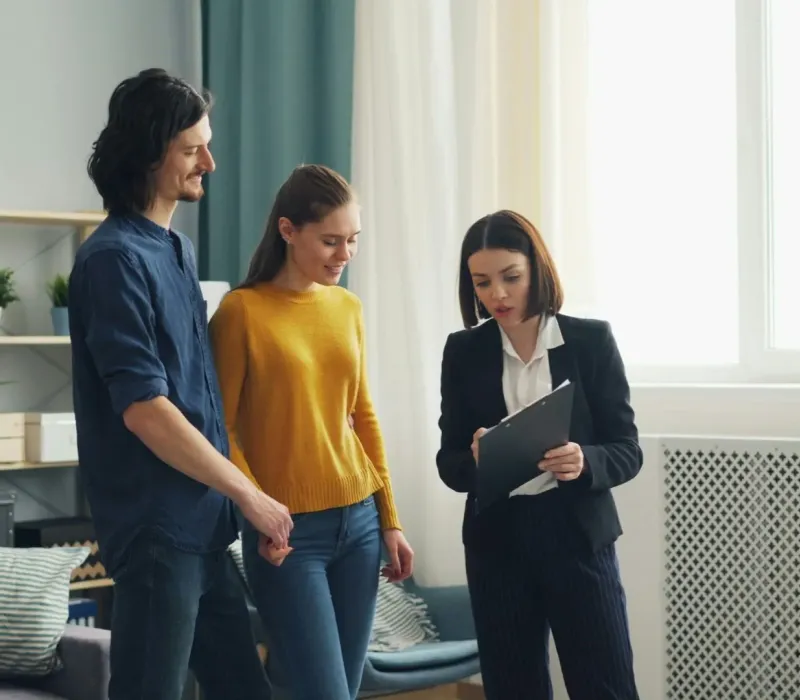 Property manager walking investors through a rental property during a BRRRR acquisition walkthrough in Eads, TN
