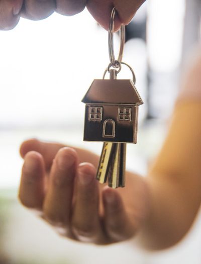 Giving keys away for new home. Property Management in Lakeland, TN