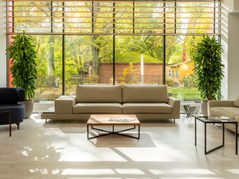 Bright, updated living room with large windows and modern finishes in a Germantown, TN rental property.