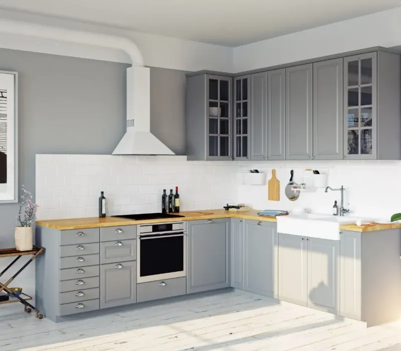 Updated rental kitchen with gray cabinets, white tile backsplash, and new countertops in Germantown, TN.