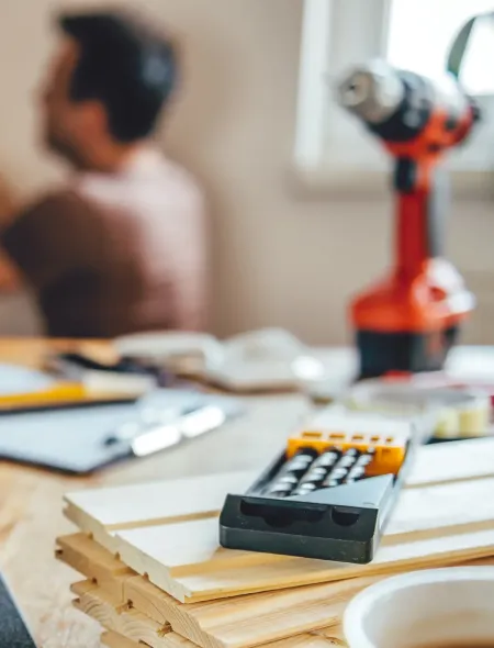 Man performing maintenance on a home.