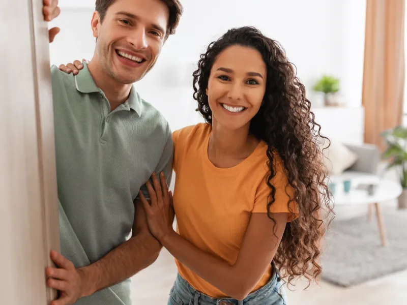 couple happy with their new purchased home