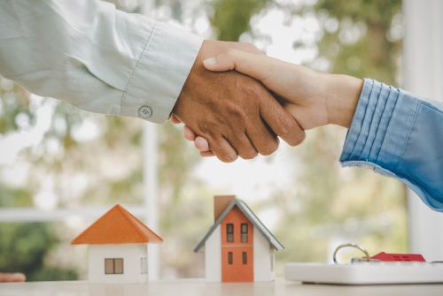 Property owners shaking hands.