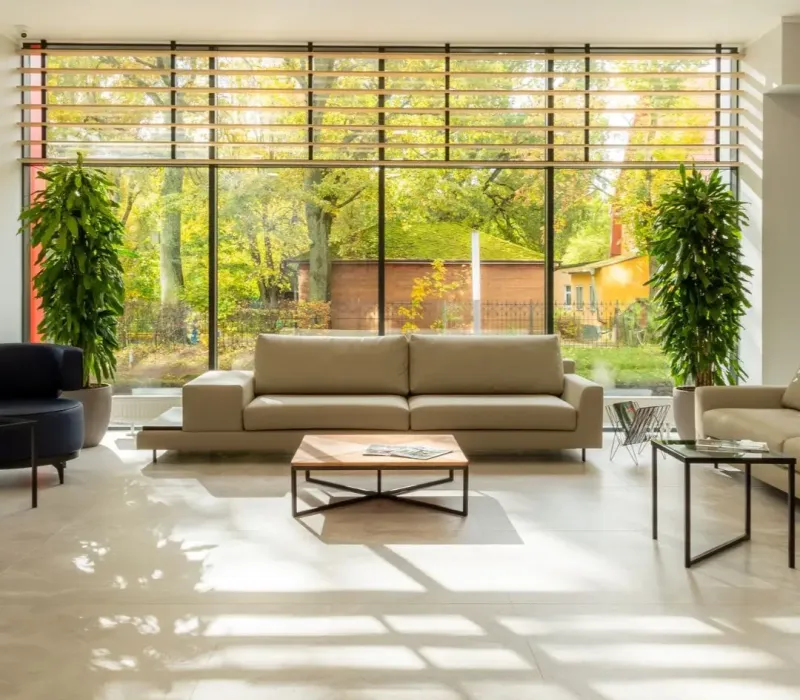Bright, updated living room with large windows and modern finishes in a Germantown, TN rental property.