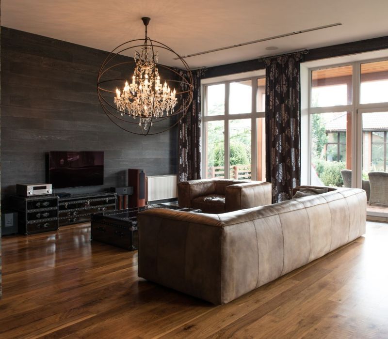 Updated living room in an Eads TN rental property showing flooring, lighting, and interior finishes for property management renovation services